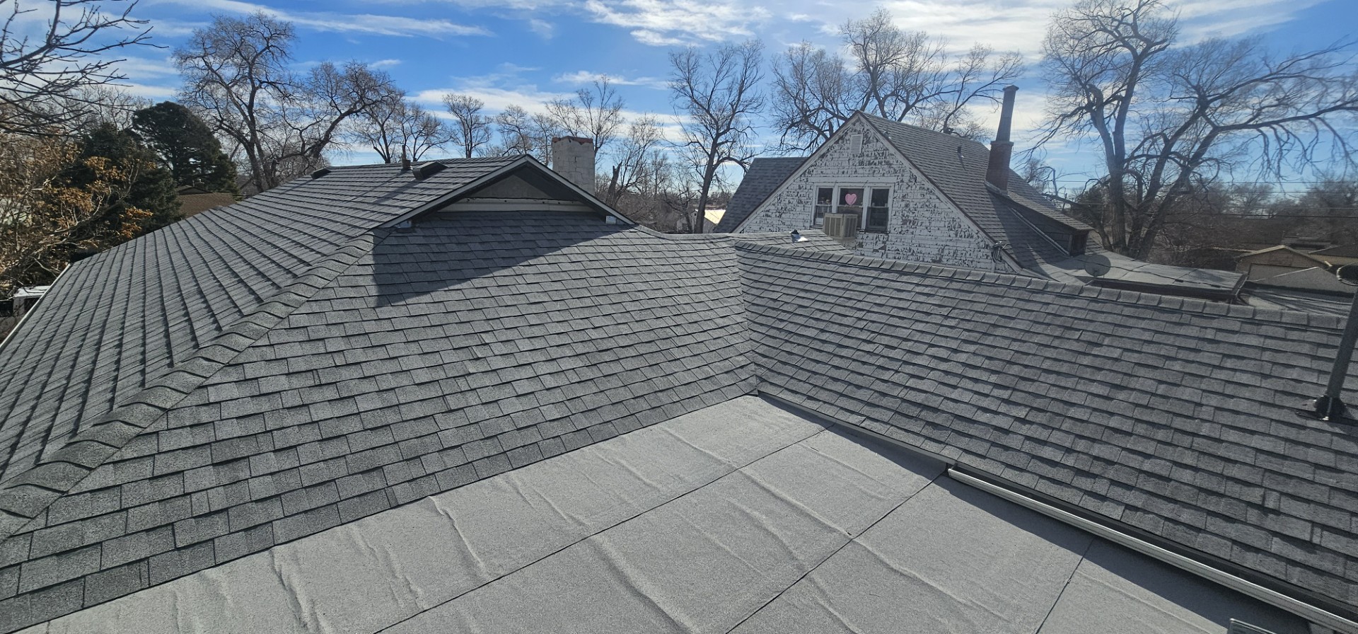 Completed shingle roof by Calvin Turner Roofing